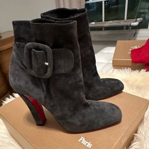 Christian Louboutin gray suede ankle booties with buckle.